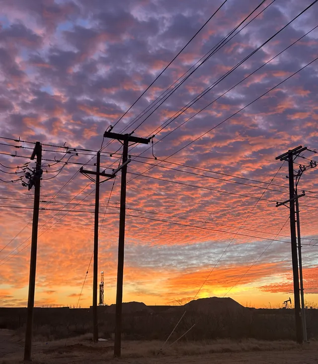 Sunset with telephone poles